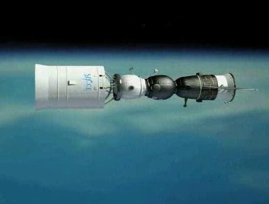 A propulsion and habitation module at left, linked up with a Soyuz spacecraft at right to create a complex designed for flying around the moon and back to Earth. Artist impression (c) Space Adventures