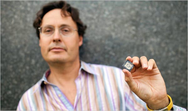 GENOME-articleLarge The inventor Jonathan Rothberg with a semiconductor chip used in the Ion Torrent machine. (c) Christopher Capozziello , NY Times