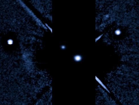 Hubble image revealing new moon, P4. (c) NASA, ESA, and A. Feild (STScI)