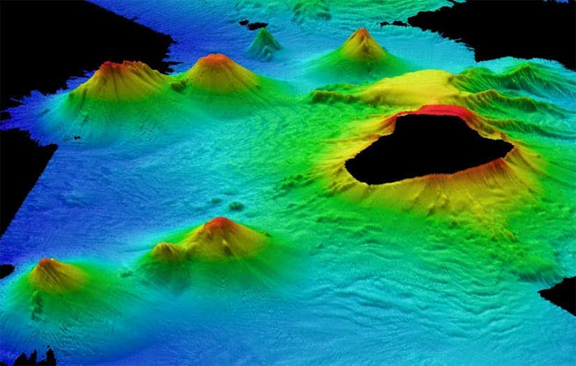 volcano-zoom Underwater volcanoes beneath the Antarctic seas. The peak in the foreground is thought to be the most active, with eruptions in the past few years. (c) British Antarctic Survey