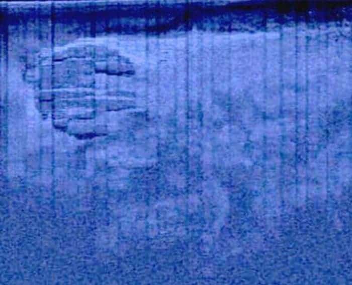 6a00d8341bf67c53ef01539068933e970b-800wi The mysterious USO (unidentified sunken object) sonar scan. If you look closer, you'll see some trails leading to it. (c) Ocean Explorer/Peter Lindberg