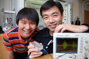 Wanglr Graduate Student Jian Shi and Materials Science and Engineering Assistant Professor Xudong Wang demonstrate a material that could be used to capture energy from respiration. (c) University of Wisconsin