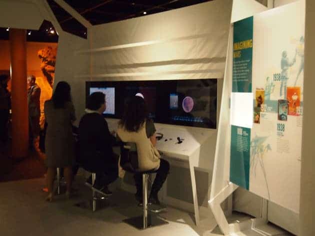 OLYMPUS DIGITAL CAMERA Beyond Planet Earth visitors can play with an interactive consoles, which transports the user into a veritable super Mars explorer which can fly around Mars and zoom in on cavernous craters, massive volcanoes, and vast valleys.