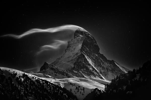 Photo and caption by Nenad Saljic  The Matterhorn 4478 m at full moon.  Zermatt, Switzerland