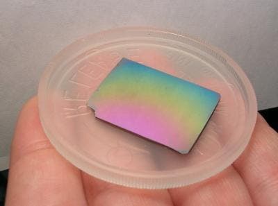 A type of glass created by researchers at the University of Wisconsin-Madison using a new vapor-deposition method is extremely stable. The rainbow of colors in this super-stable glass comes from variations in its thickness. Credit: Mark Ediger/University of Wisconsin-Madison 