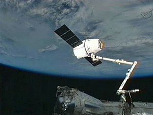 A screencapture of the Dragon docked with the ISS. (c) NASA.tv