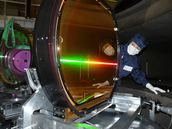 Scientists inspecting the compressor of the Vulcan Petawatt laser. 