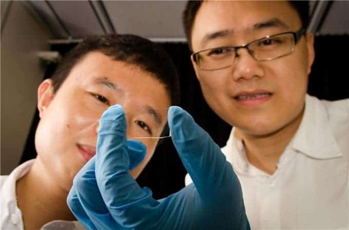 NTU Asst Prof Wang Qijie, 34, and lead author PhD student Liu Tao, 29, looking at their newly designed nanostructured graphene. (Photo : Nanyang Technological University)