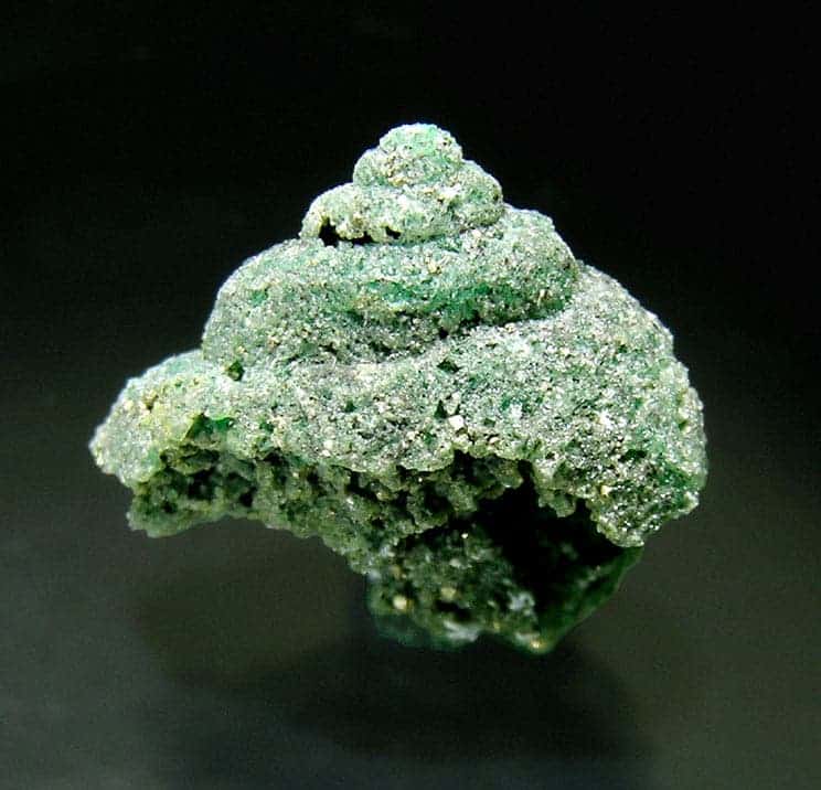 Beryl (Emerald) replacing fossil