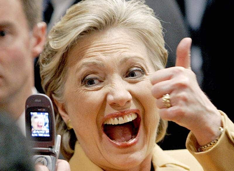 fake smile hilary