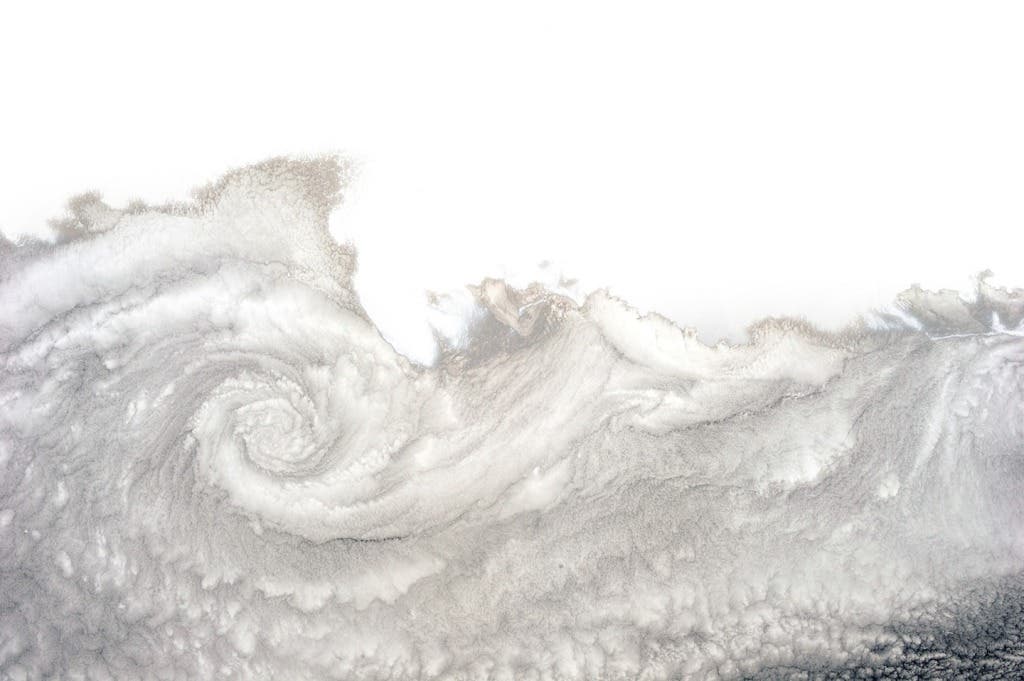A twist of cloud near Arica, Chile. You see these frequently in this part of the world because the Pacific is cold, the land is warm, and the currents and winds combine to form a cloudy vortex—clockwise here, because it’s the southern hemisphere. North of the equator, the spiral would turn counter-clockwise.