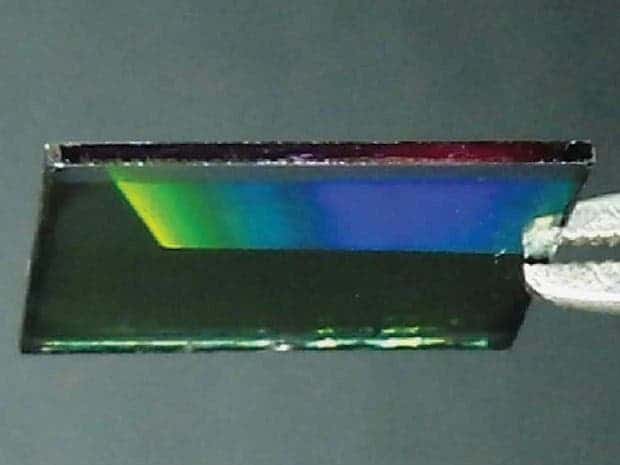 Optical images of a half-patterned solar cell showing iridescent scattering due to the periodic nature of the Blu-ray pattern. Credit: Northwestern University