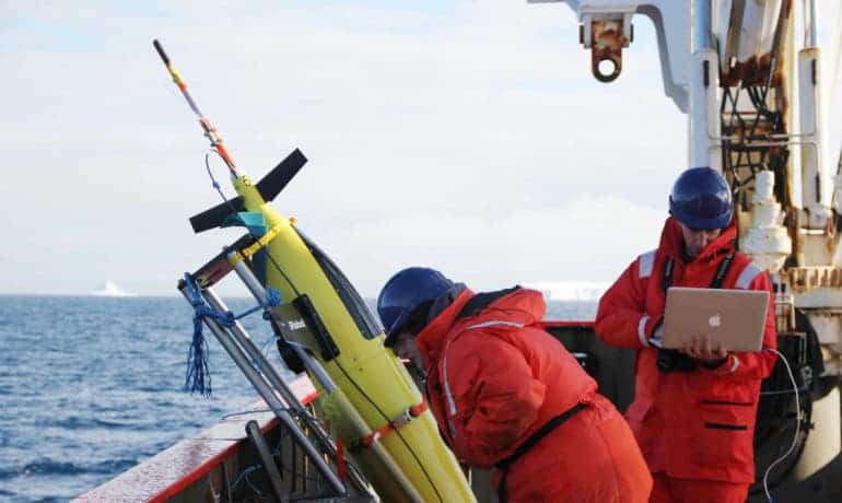 Oceanographers Liz Creed (Kongsberg, Inc.) and Andy Thompson (Caltech) run through a series of tests in preparation for the release of a Seaglider into the Weddell Sea in January 2012. (Credit: Alan Jamieson/Caltech)