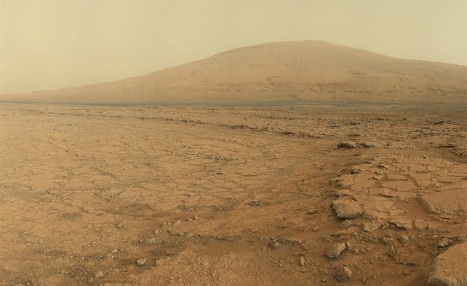 Stunning panoramic view of Mount Sharp at a distance taken by Curiosity rover. Credit: NASA