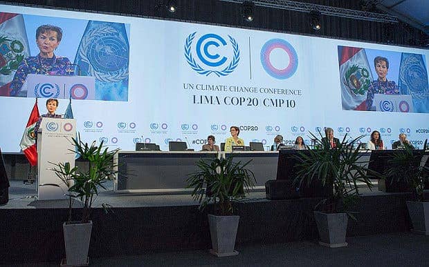 Christiana Figueres (L), executive secretary of the United Nations Framework Convention on Climate Change (UNFCCC) addresses the opening meeting of the plenary session Photo: Xinhua News Agency/REX