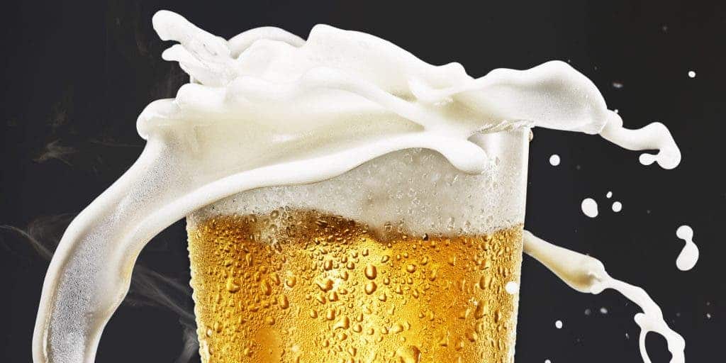 Foam gushing off a pint - you either love it or hate it. Credit: 
