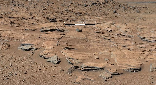This image from Curiosity's Mastcam shows inclined beds of sandstone interpreted as the deposits of small deltas fed by rivers flowing down from the Gale Crater rim and building out into a lake where Mount Sharp is now. Credit: NASA/JPL-Caltech/MSSS