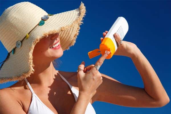 woman sunscreen beach