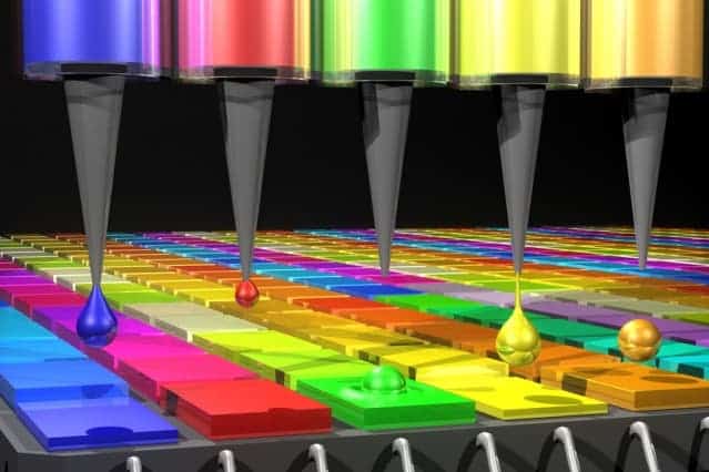 In this illustration, the Quantum Dot (QD) spectrometer device is printing QD filters — a key fabrication step.  The dots are made by printing droplets. Image: MIT