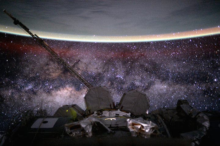  "Day 135. Milky Way. You're old, dusty, gassy and warped. But beautiful. Good night from the International Space Station!"
