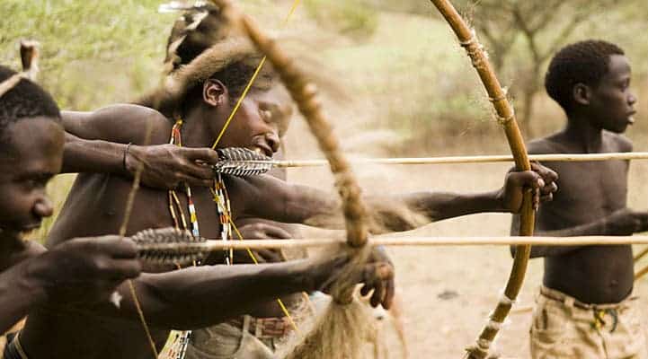 Hadza hunter gathers. They grow no food, raise no livestock, and live without rules or calendars. They are living a hunter-gatherer existence that is little changed from 10,000 years ago. Image: Bellenews