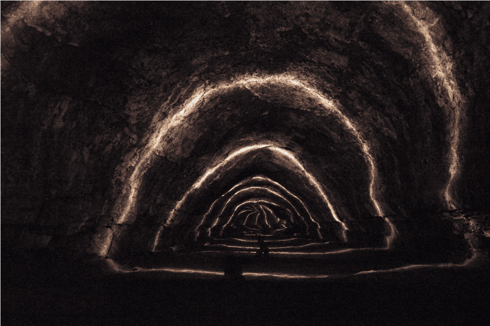 Long exposure picture of a lava tube near Bend, OR. The lighting is artificial. Image credits to Michael Harms. 