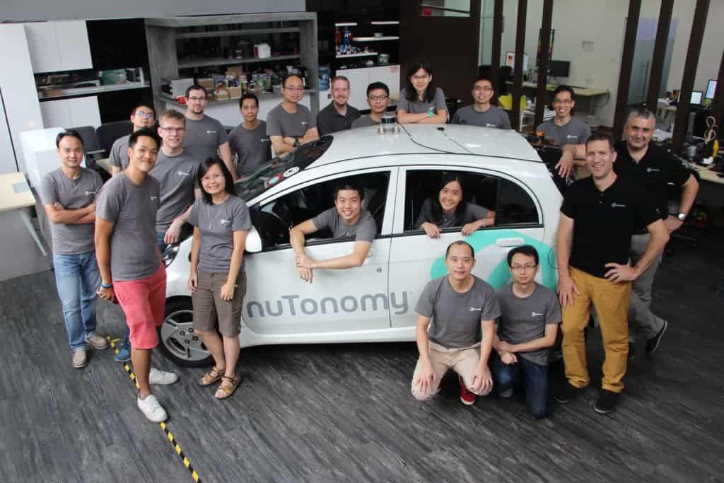 The team behind the autonomous taxis. Image via nuTonomy.