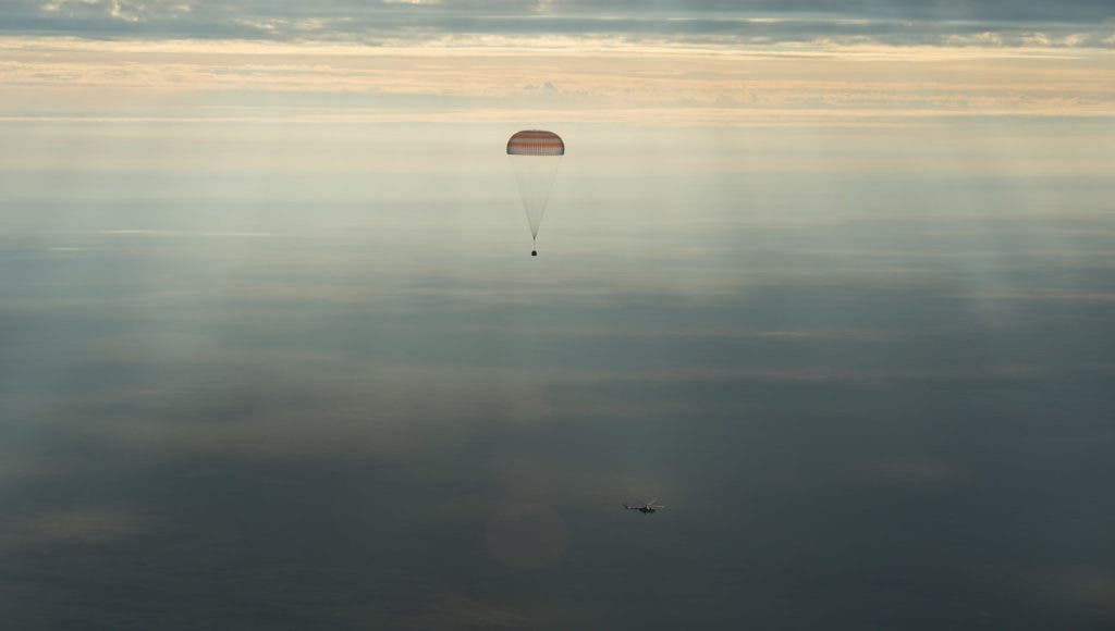 astronauts back to earth