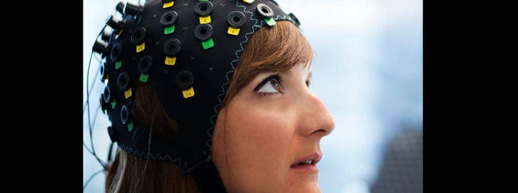 This non-invasive brain-computer interface (BCI) can detect the response of locked-in patients who are too disabled to communicate by measuring changes in blood oxygen levels in the brain. Credit: Wyss Center. 