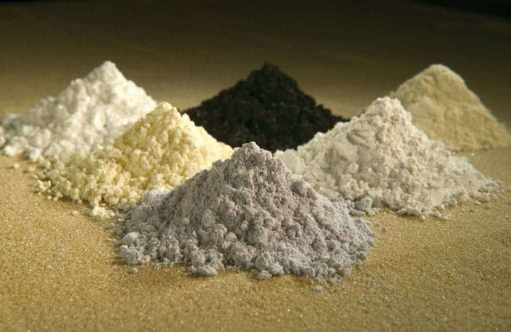 Rare earth elements are usually produced as oxides. Clockwise from top center: praseodymium, cerium, lanthanum, neodymium, samarium, and gadolinium.