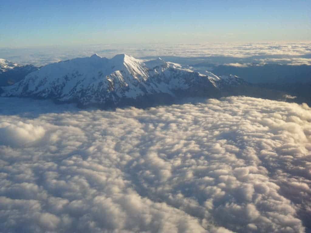 Illimani Mountain, Bolivia. It's 20,000 feet above sea level and researchers have to climb it all by foot -- with drilling equipment tagged along. Credit: Wikimedia Commons.