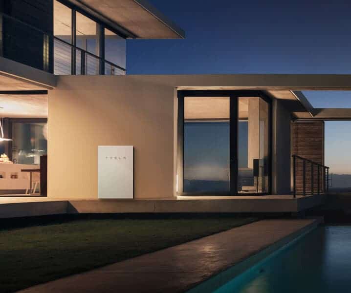 Tesla dreams of an integrated, sustainable household where energy comes from Tesla solar panels during the day and Tesla's PowerWall during the night. A Tesla electric car sits nicely in the garage, charged by renewable energy. Credit: Tesla.