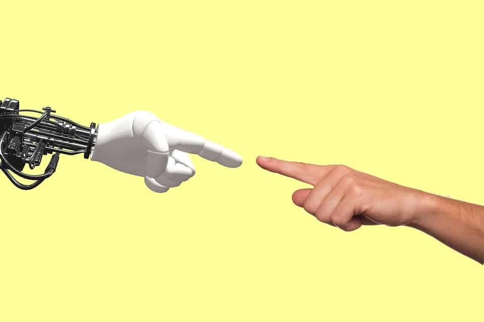 Robot and human hands.