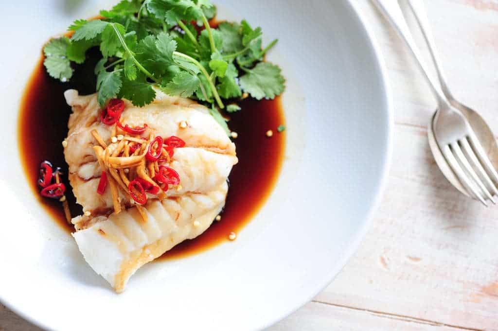 Steamed fish with soy and ginger.
