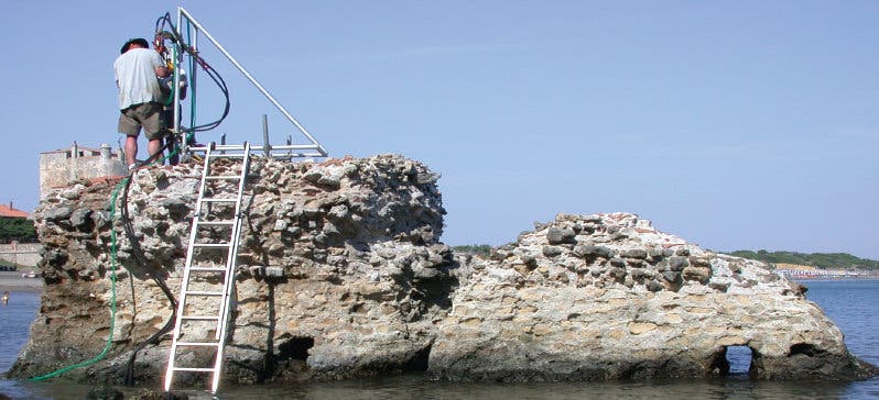 Samples from this Ancient Roman pier, Portus Cosanus in Orbetello, Italy, were studied with X-rays at Berkeley Lab. Credit: J.P. Oleson.