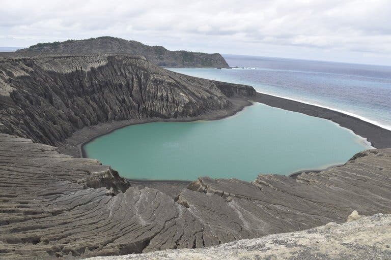 The crater lake from the summit rim at the center of Hunga Tonga-Hunga Ha’apai. Credit: NASA.