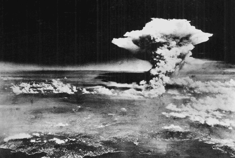 A mushroom cloud billows into the sky about an hour after an atomic bomb was dropped on Hiroshima, Japan. US Army via Hiroshima Peace Memorial Museum.