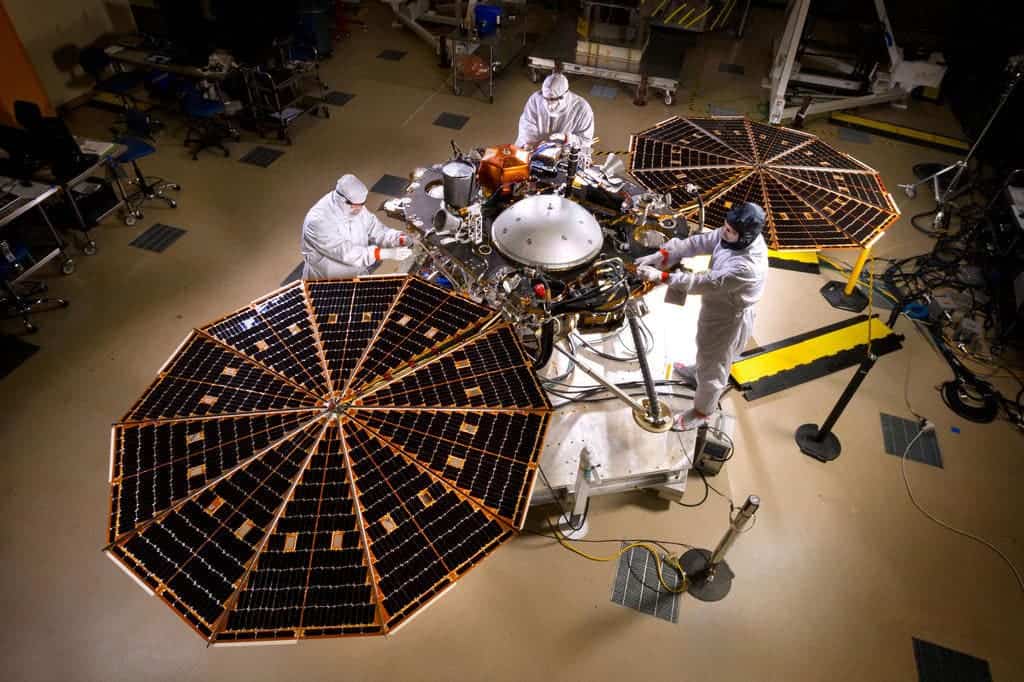 Technicians inspect InSight instruments. Credit: NASA.