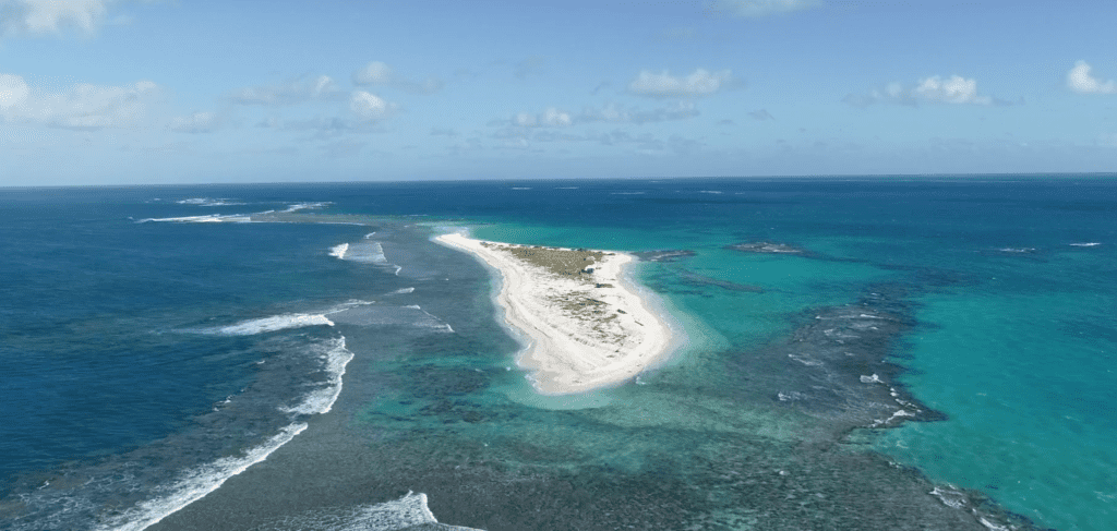 East Island looking serene and welcoming. A cat-3 hurricane destroyed most of it. Credit: YouTube.