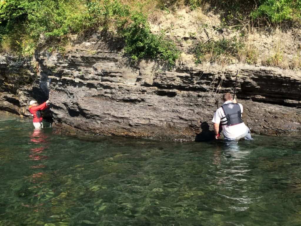 Alex Zumberge (right) collects 750 million-year-old rocks from a lake outcrop in Sweden. Credit: UC Riverside.