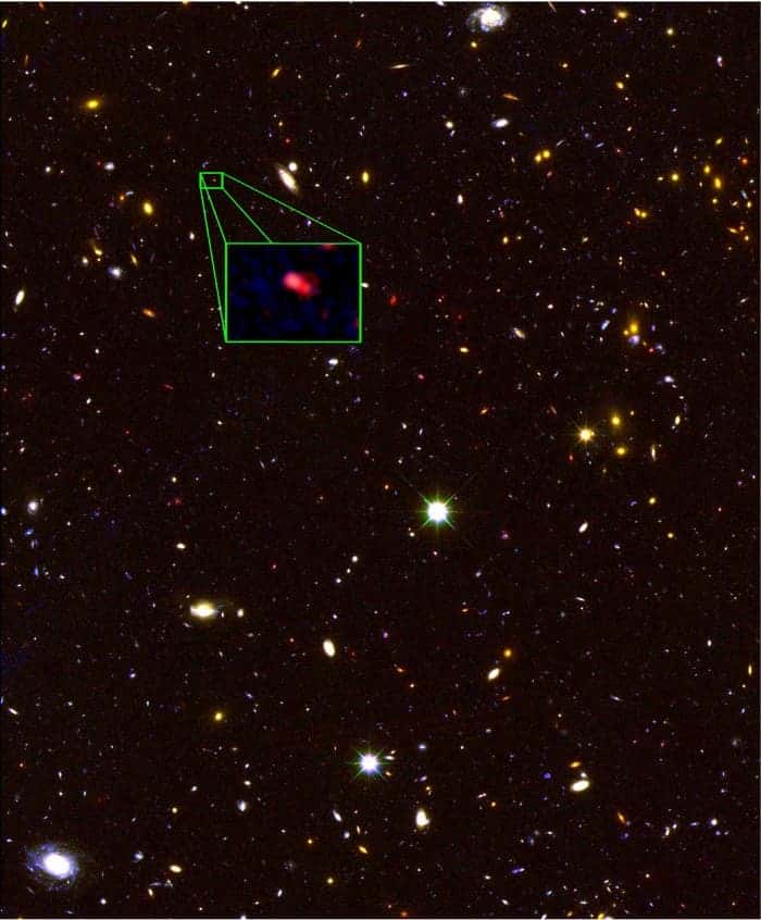 Ancient galaxies such as z8_GND_5296 appear red for two reasons; the lack of young blue stars and the stretching in the wavelength of emitted light due to cosmic redshift. (V. Tilvi, Texas A&M University/S.L. Finkelstein, University of Texas at Austin/C. Papovich, Texas A&M University/CANDELS Team and Hubble Space Telescope/NASA)