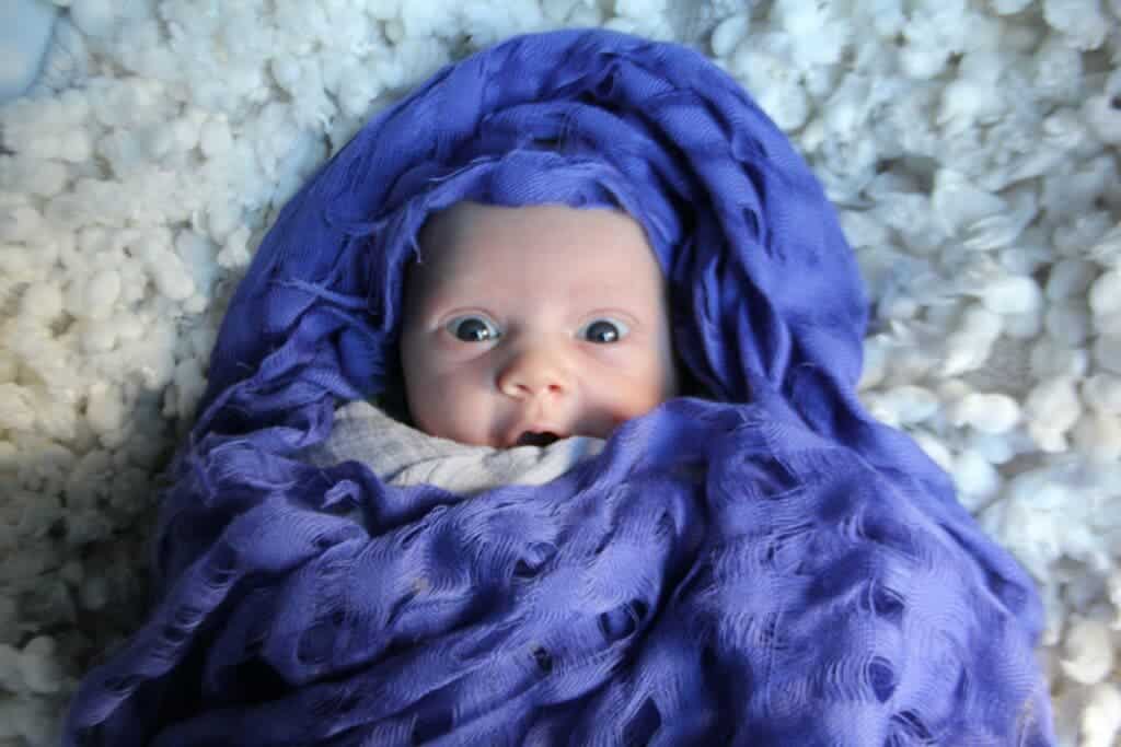 A new born baby.