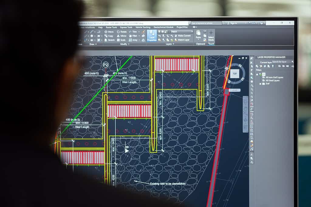Structural engineer working on computer