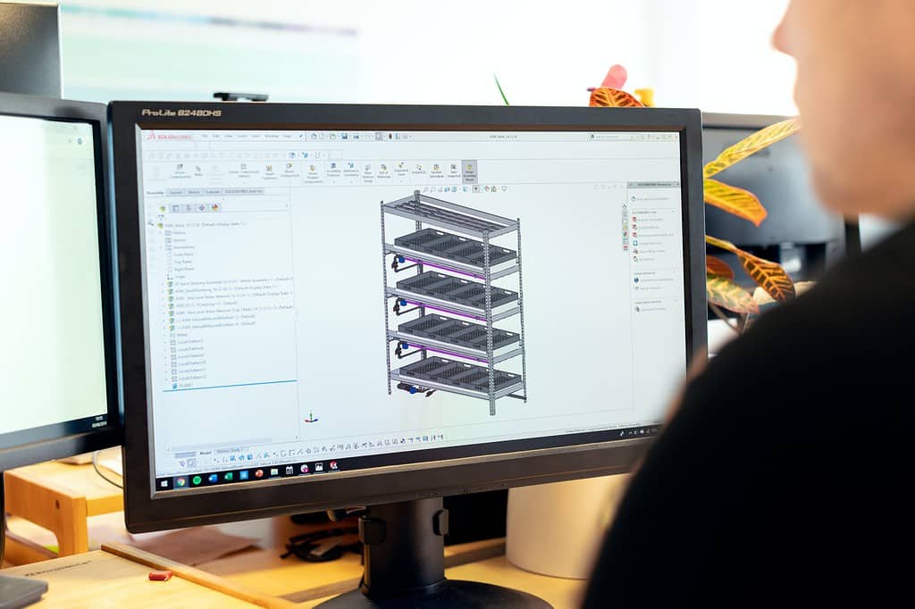 Structural engineer working on project in front of computer screen