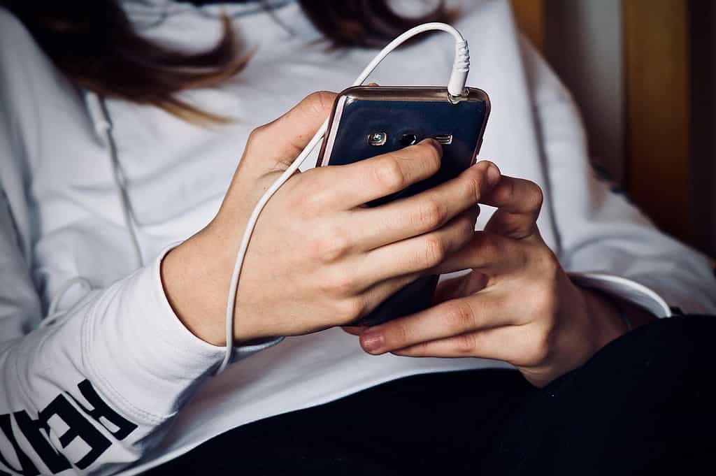 Smartphone with headphone jack plugged in
